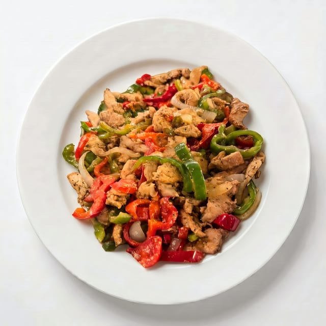 Fajitas de Bistec, Pollo, Puerco o Camarón (Fajitas Steak, Chicken, Pork, or Prawns).